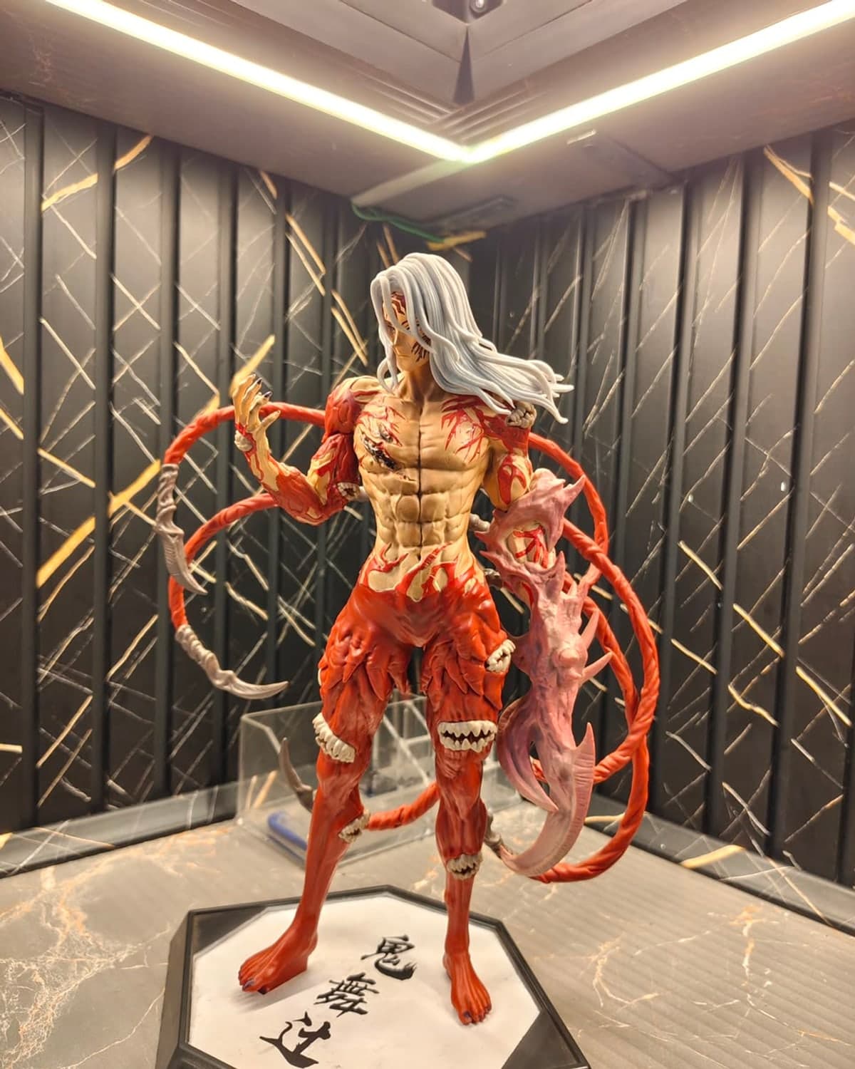 Large anime villain collectible figure in the studio display